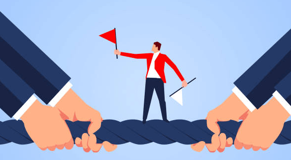  picture of a small figure in red standing on a rope with identical hands pulling the rope on either side. Is your coach in a tug of war between your goals and your organisations?