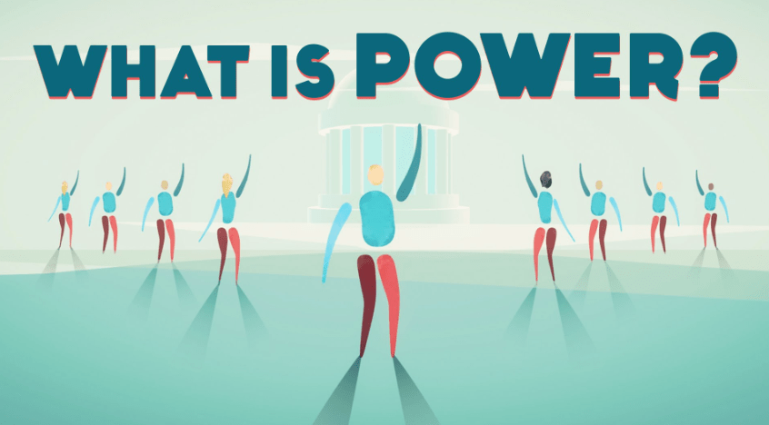 A cartoon image with "What is power?" written in all caps at the top and a number of cartoon figures with one hand in the air arrayed underneath the writing